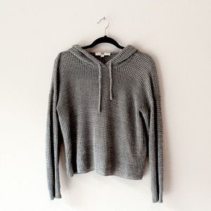 Grey sweater hoodie.